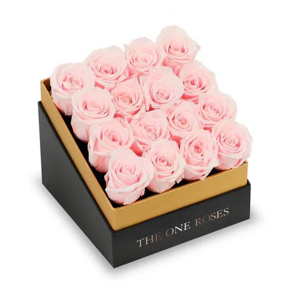 Box of pale pink roses in a black and gold gift box