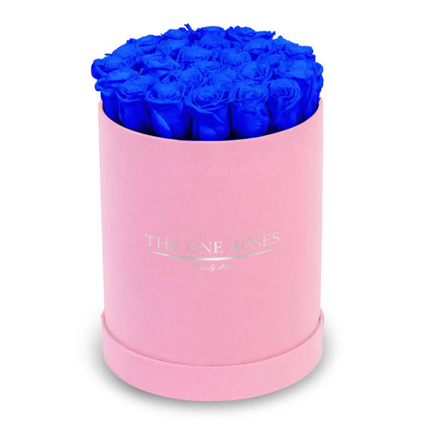 Blue roses in a pink round box