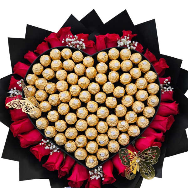Heart-shaped chocolate gift with red roses and black wrapping