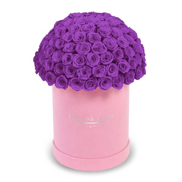 Purple rose bouquet in a pink round box