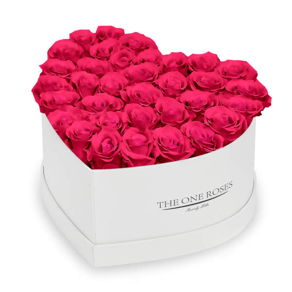 Heart-shaped box of bright pink roses