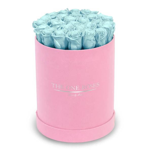 Blue roses in a pink round box