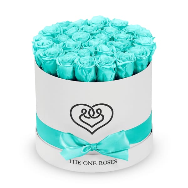 Round box of turquoise roses with a satin ribbon