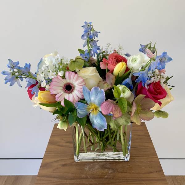 Colorful mixed bouquet in a clear glass vase