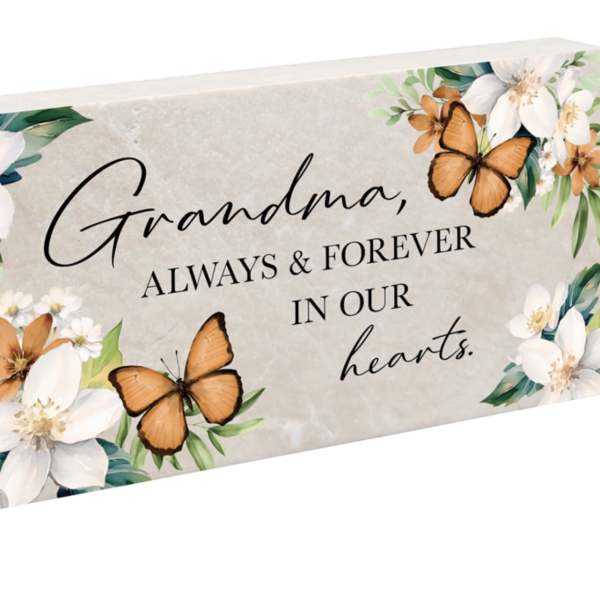 Decorative sympathy plaque with flowers and butterflies and the words Grandma, always & forever in our hearts.