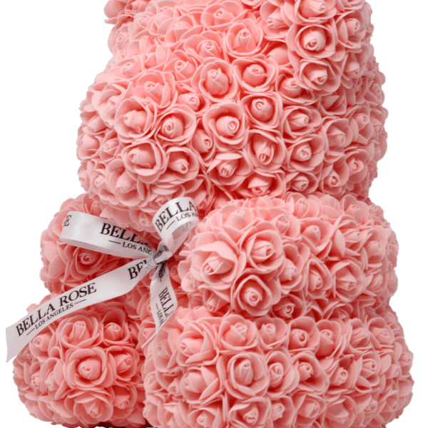 Stacked pink rose-shaped gift boxes tied with ribbon