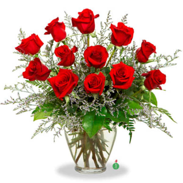 Bouquet of red roses in a clear glass vase