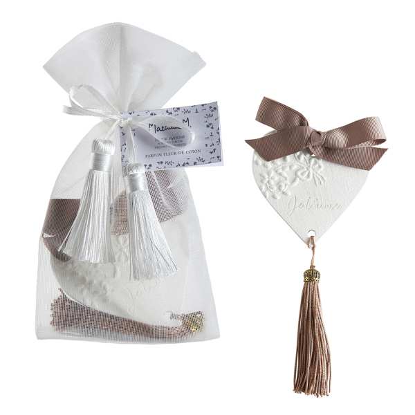 Decorative heart-shaped ornament and a mesh gift pouch with tassels