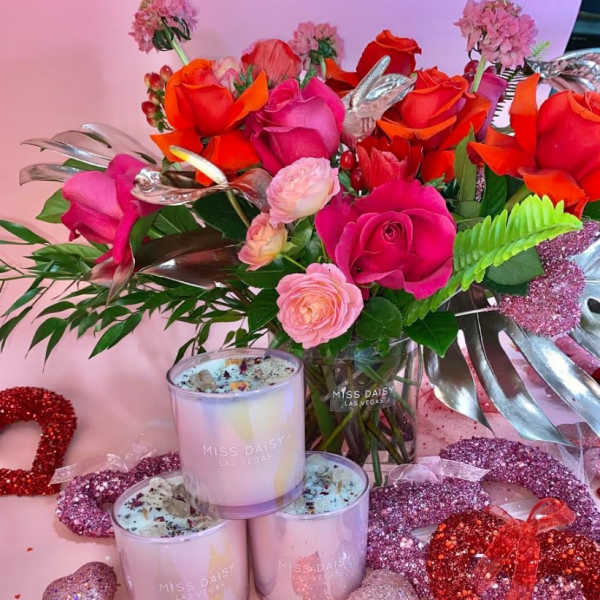 Pink and red rose bouquet with glitter hearts and candles