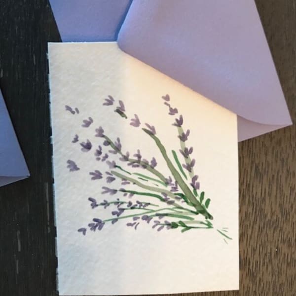 Lavender folded cards with a small lavender flower illustration