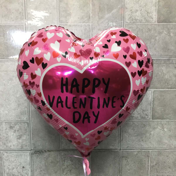 Pink heart-shaped balloon with "Happy Valentine's Day" text