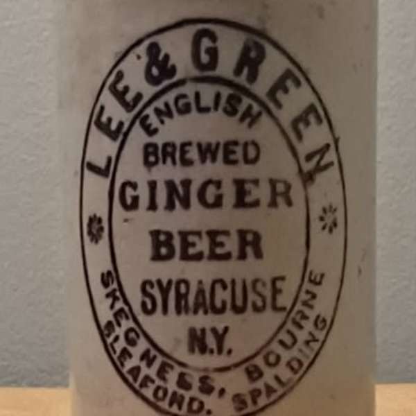 Vintage ceramic bottle labeled brewed ginger beer