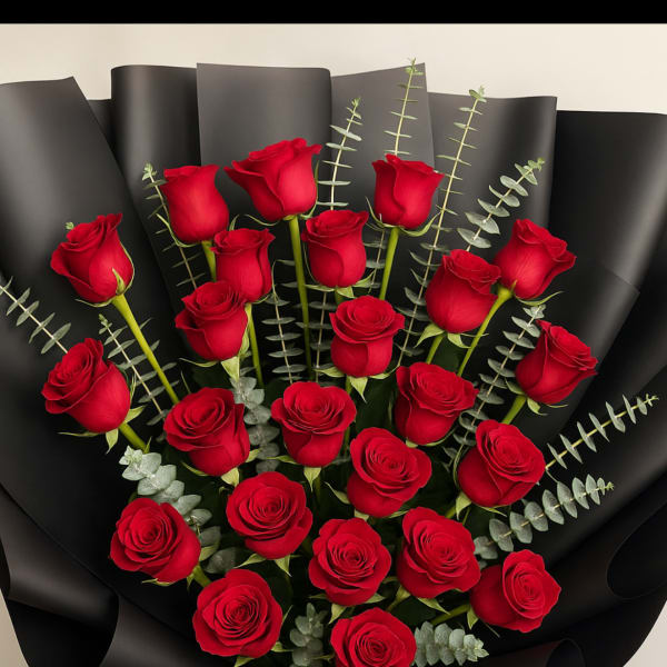 Bouquet of red roses wrapped in black paper with a black ribbon