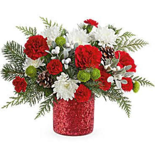 Red and white floral arrangement in a glittery red vase
