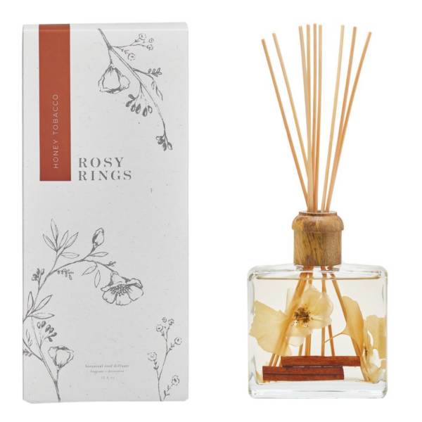 Floral reed diffuser in a glass bottle with boxed packaging