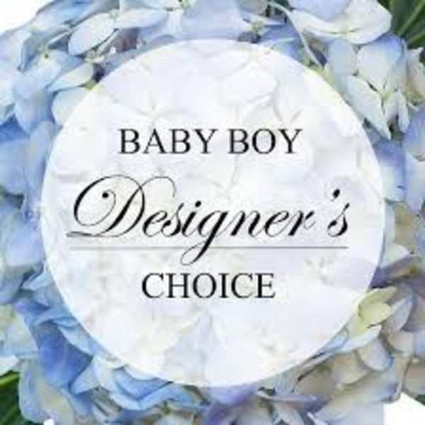 Blue and white floral arrangement with a "Baby Boy Designer's Choice" sign