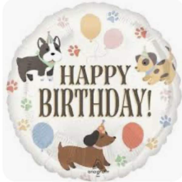 Round birthday balloon with dog illustrations and paw prints
