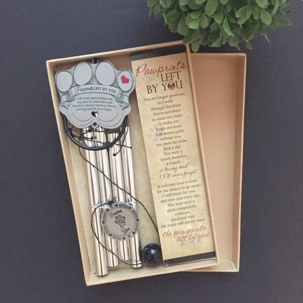 Pet memorial gift set with pawprint keepsakes and a sympathy poem card