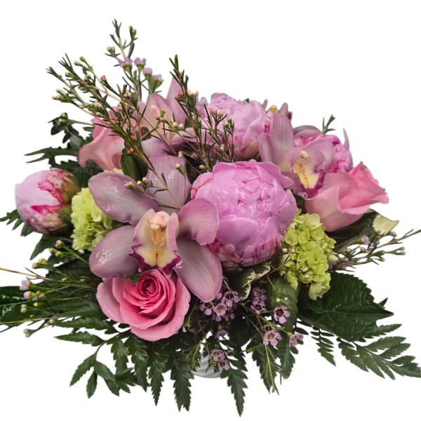 Pink and lavender bouquet with orchids, roses, and peonies