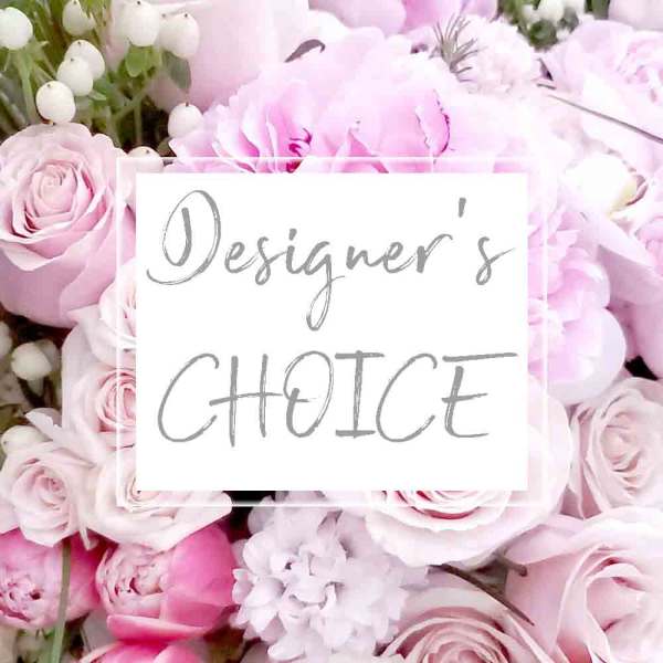 Pink roses and peonies with white blossoms in a close-up floral arrangement