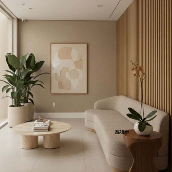 Minimalist living room with potted plants and a small orchid arrangement