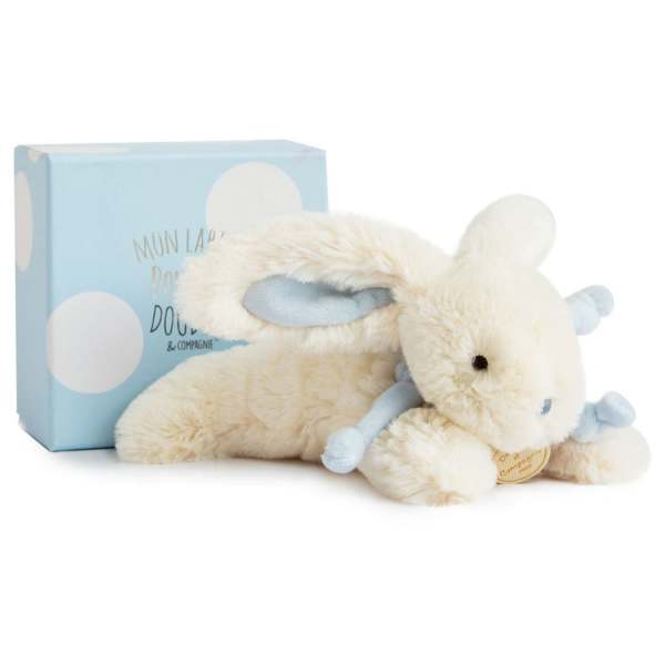 Plush white bunny with pale blue accents beside a light blue gift box