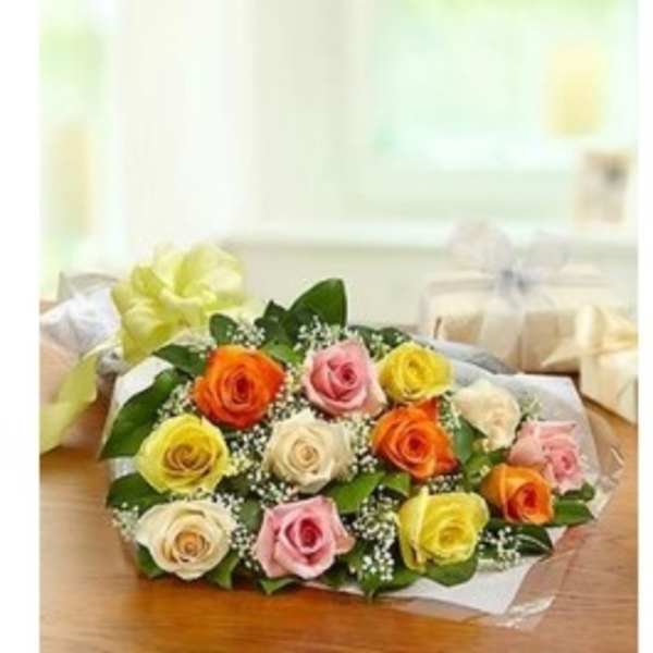 Bouquet of multicolored roses with baby's breath