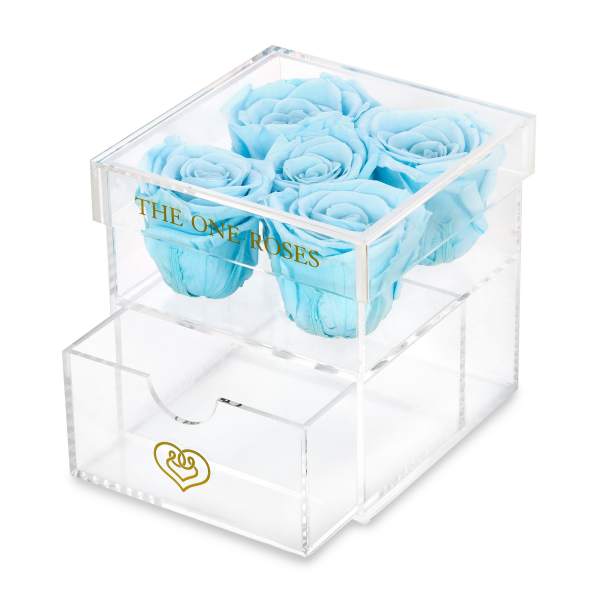 Blue roses in a clear acrylic gift box with a drawer