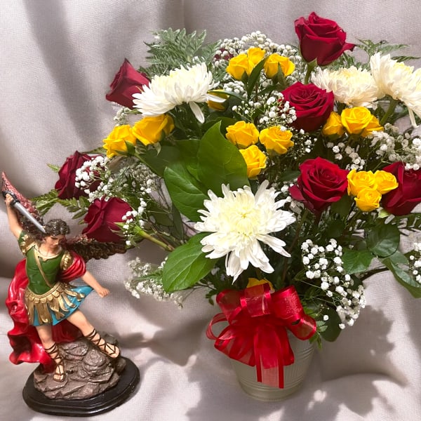 Bouquet of red and yellow roses with white chrysanthemums in a vase