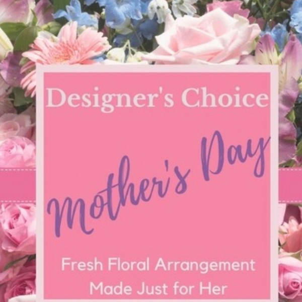 Pink floral arrangement with a Mother's Day sign