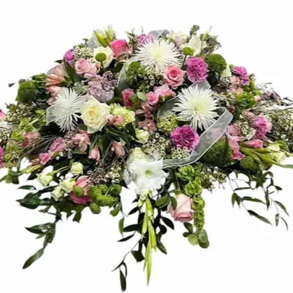 Large pink and white floral spray with cascading greenery
