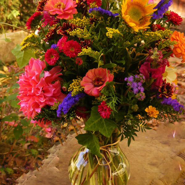 Colorful mixed bouquet in a clear glass vase