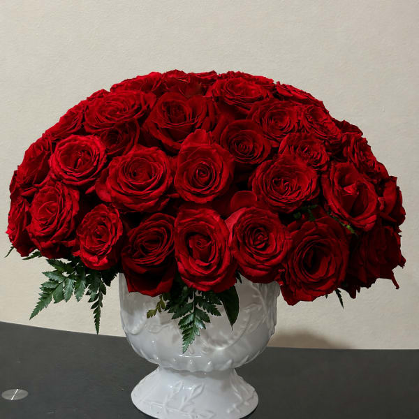 Red roses in cup