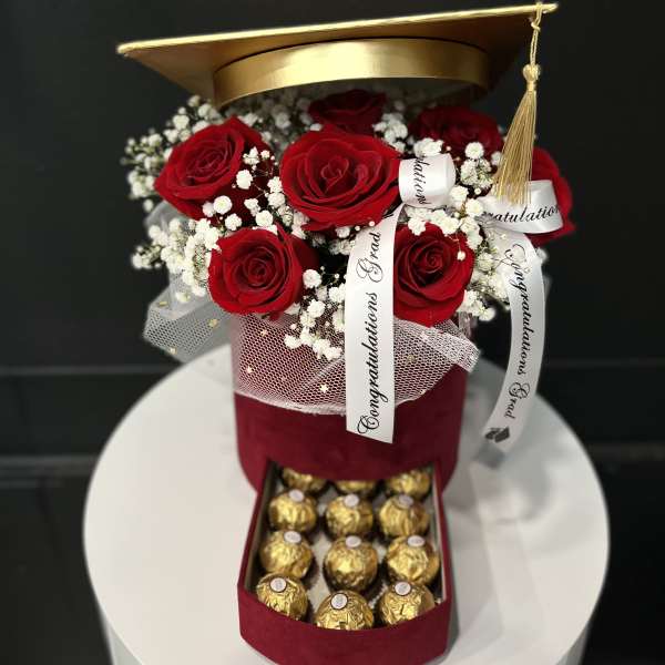 Graduation flowers in the box with 12 chocolates!