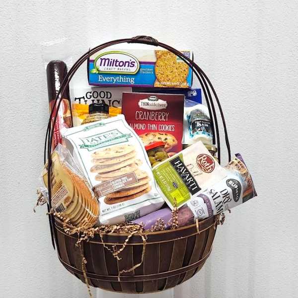 Basket of assorted packaged snacks and crackers