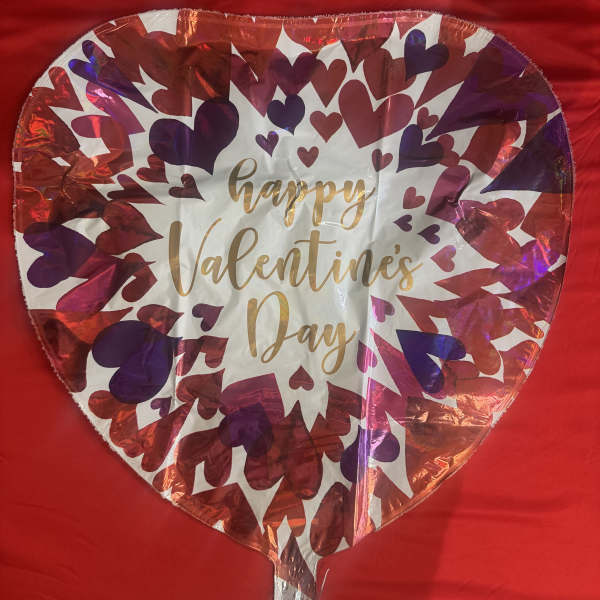 Heart-shaped foil balloon with "Happy Valentine's Day" text