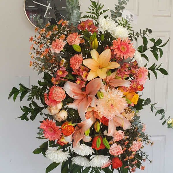 Orange and Peach Funeral Spray