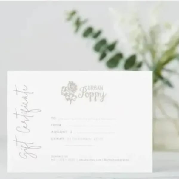 Gift certificate card with a blurred floral background