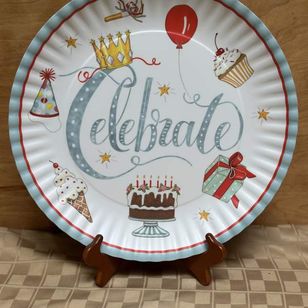 Decorative paper plate with "Celebrate" text and birthday icons
