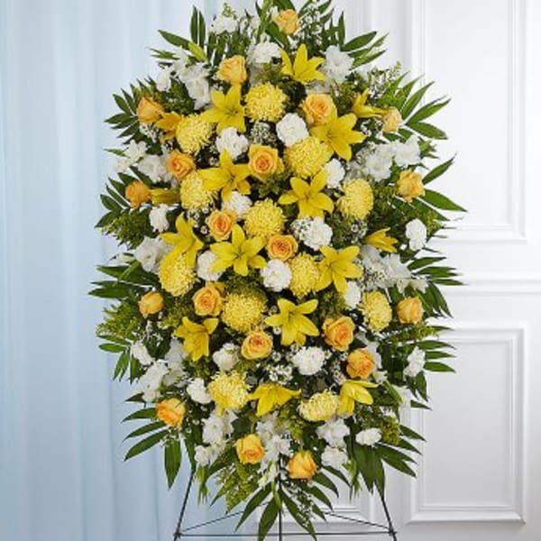 Heavenly spray of yellow roses and yellow pincushions Easel