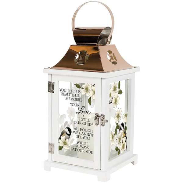 White memorial lantern with floral panels and a sympathy message