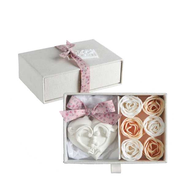 Gift box with a heart ornament and six rose-shaped soaps