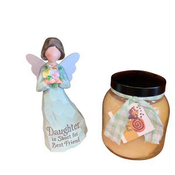 Angel figurine and a candle jar with ribbon and tag
