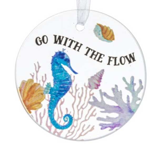 Round hanging ornament with a seahorse and the words Go With The Flow
