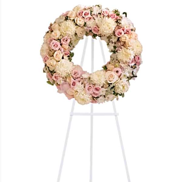 Pink and white funeral standing spray