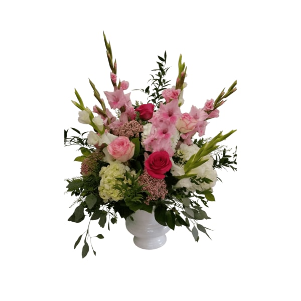 Pink and white floral arrangement in a white vase