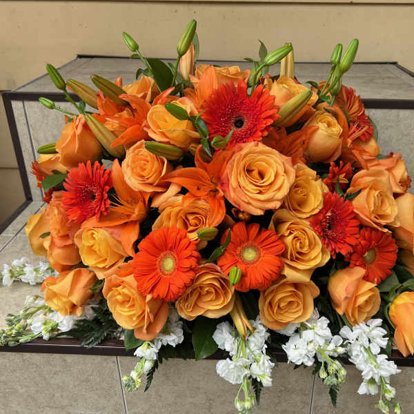 Orange Casket Spray