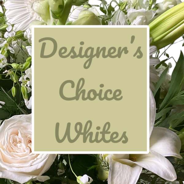 White floral arrangement with roses, lilies, and green buds