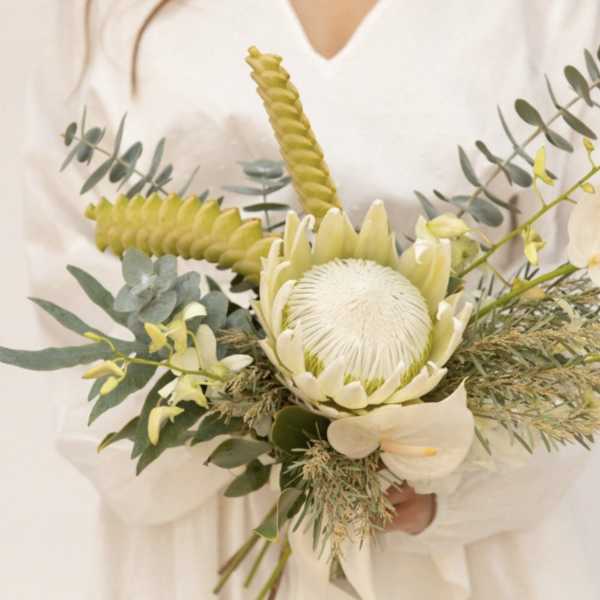 Heavenly wedding bouquet tones of white yellow silver eucalyptus greens