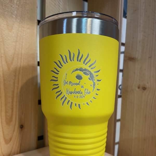 Yellow insulated tumbler with a sun graphic and printed text